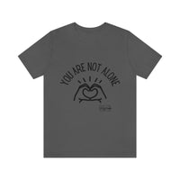 Load image into Gallery viewer, “You Are Not Alone” Unisex Jersey Short Sleeve Tee - Fck the Stigma
