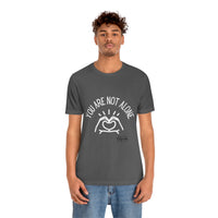 Load image into Gallery viewer, “You Are Not Alone” Unisex Jersey Short Sleeve Tee - Fck the Stigma
