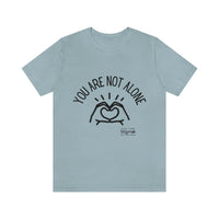 Load image into Gallery viewer, “You Are Not Alone” Unisex Jersey Short Sleeve Tee - Fck the Stigma
