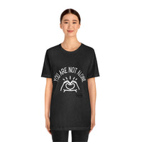 Load image into Gallery viewer, “You Are Not Alone” Unisex Jersey Short Sleeve Tee - Fck the Stigma
